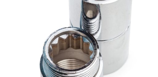 Set of metal-plastic plumbing couplings, adapters, plugs isolated on white background